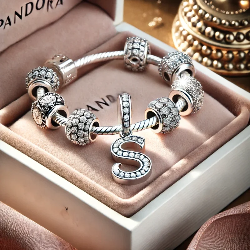 A beautiful piece of personalized jewelry in the style of Pandora featuring the letter 'S'. The jewelry includes a silver charm shaped like the letter